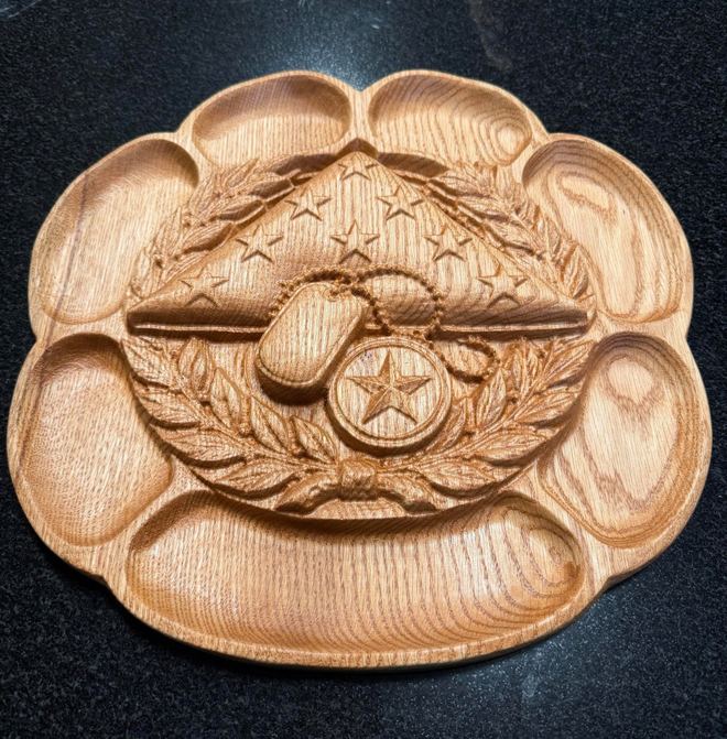 Bas-relief carving by Jeff Miller