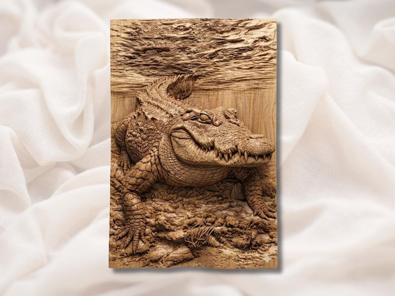 Bas-relief wood carving of an alligator resting on a muddy swamp bank with rippling water behind it