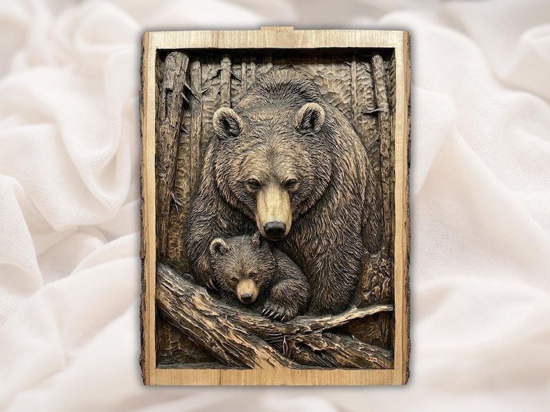Bas-relief wood carving of a mother bear protecting her sleeping cub in a pine forest.