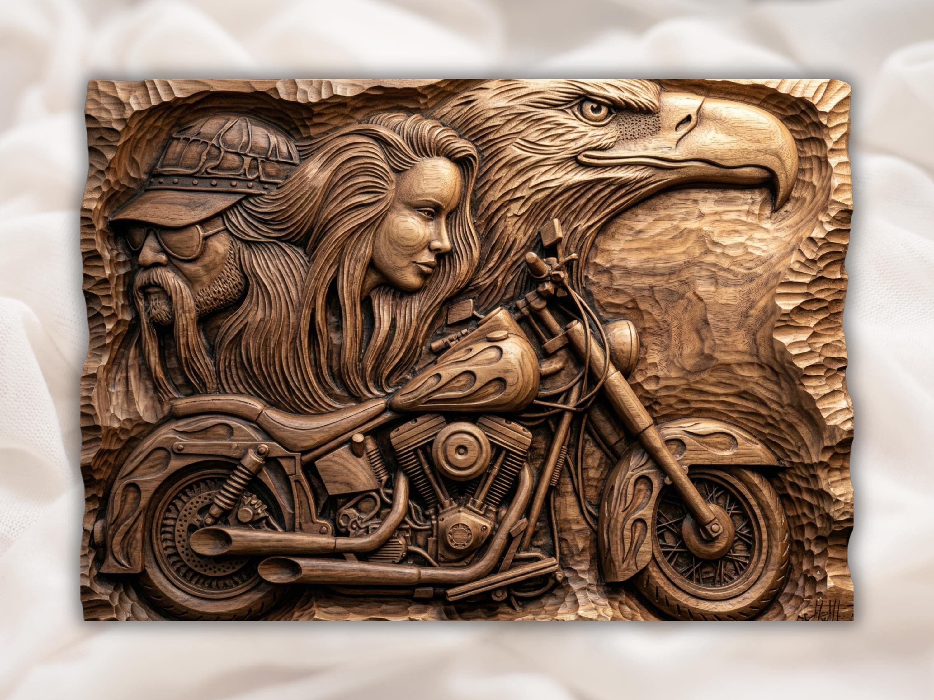 Carved wood bas-relief of a long-haired woman, a flame-tank chopper with V-twin engine, and a soaring eagle behind.