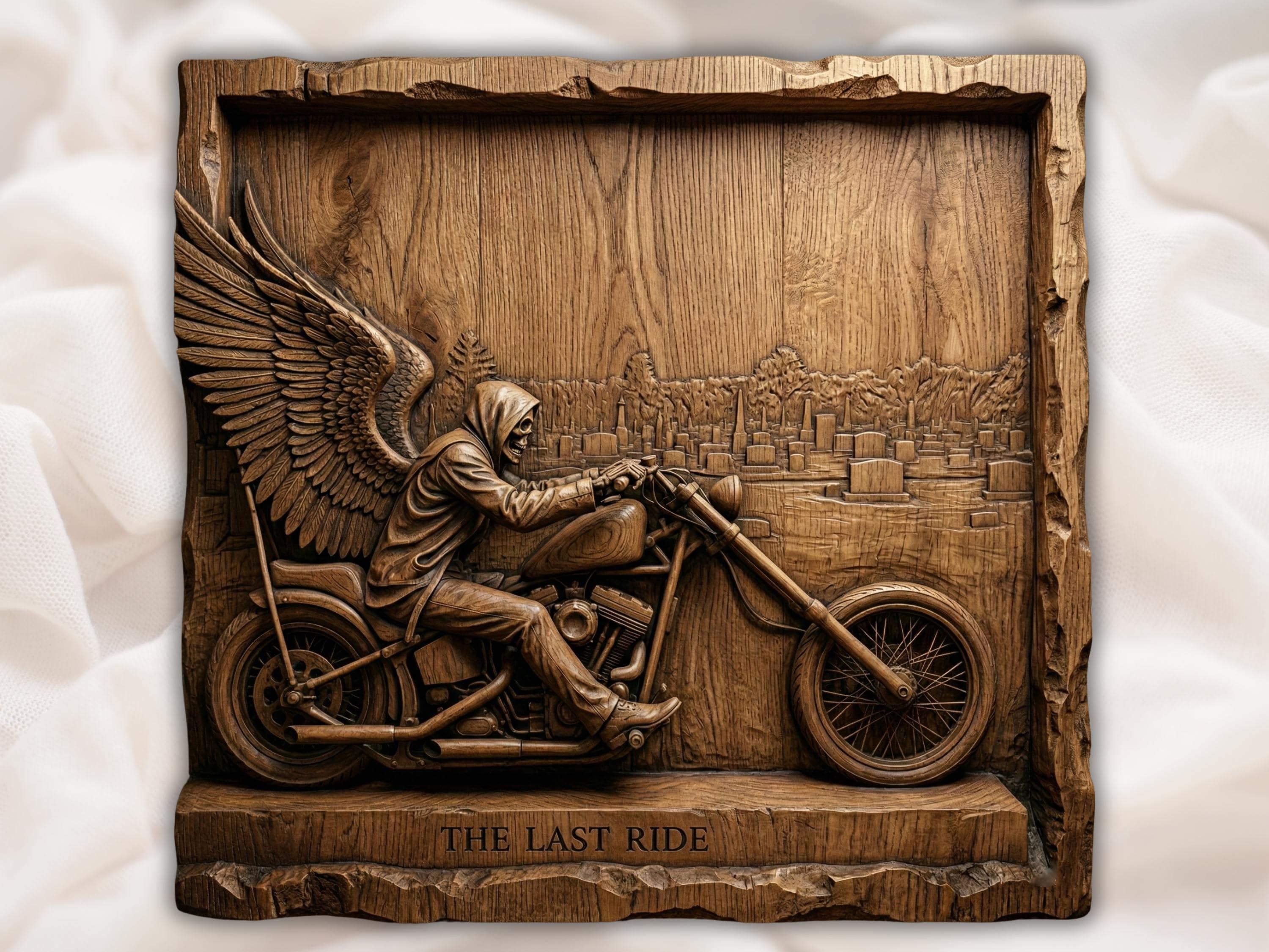 Wood relief carving of a hooded skeleton riding a chopper motorcycle past graveyard headstones, titled The Last Ride.