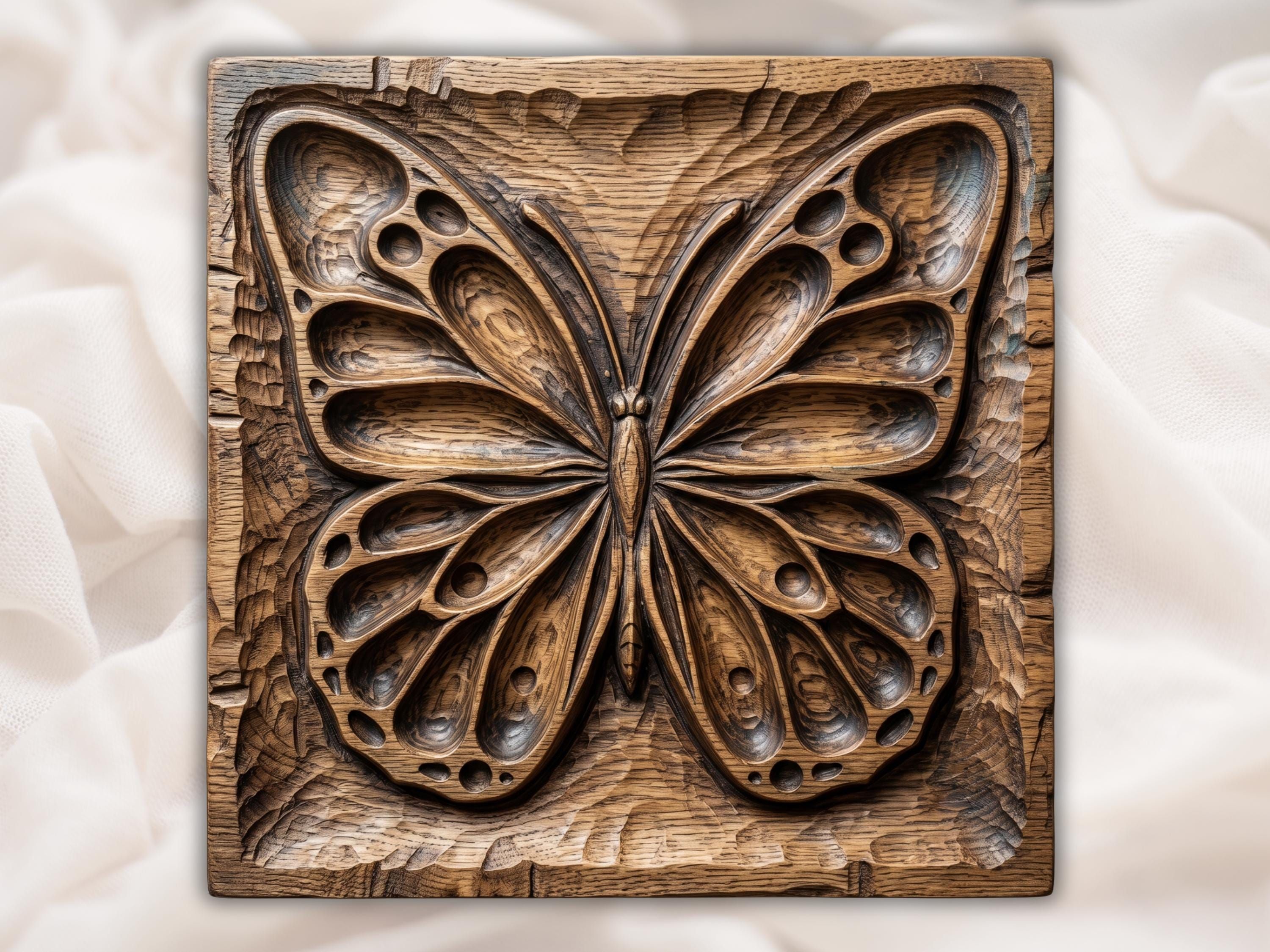 Carved wood bas-relief of a symmetrical butterfly with spread wings and detailed, hollowed wing panels.