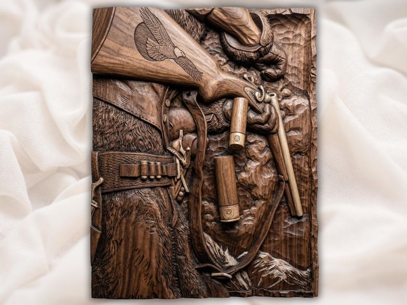 Carved wood relief of a lever-action rifle with eagle-engraved stock, leather cartridge belt, and shells over mountains