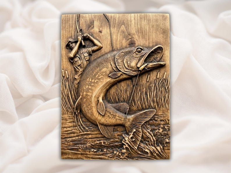 Wood carved bas-relief of a large muskie fish leaping from reeds while a fisherman fights it on the rod.