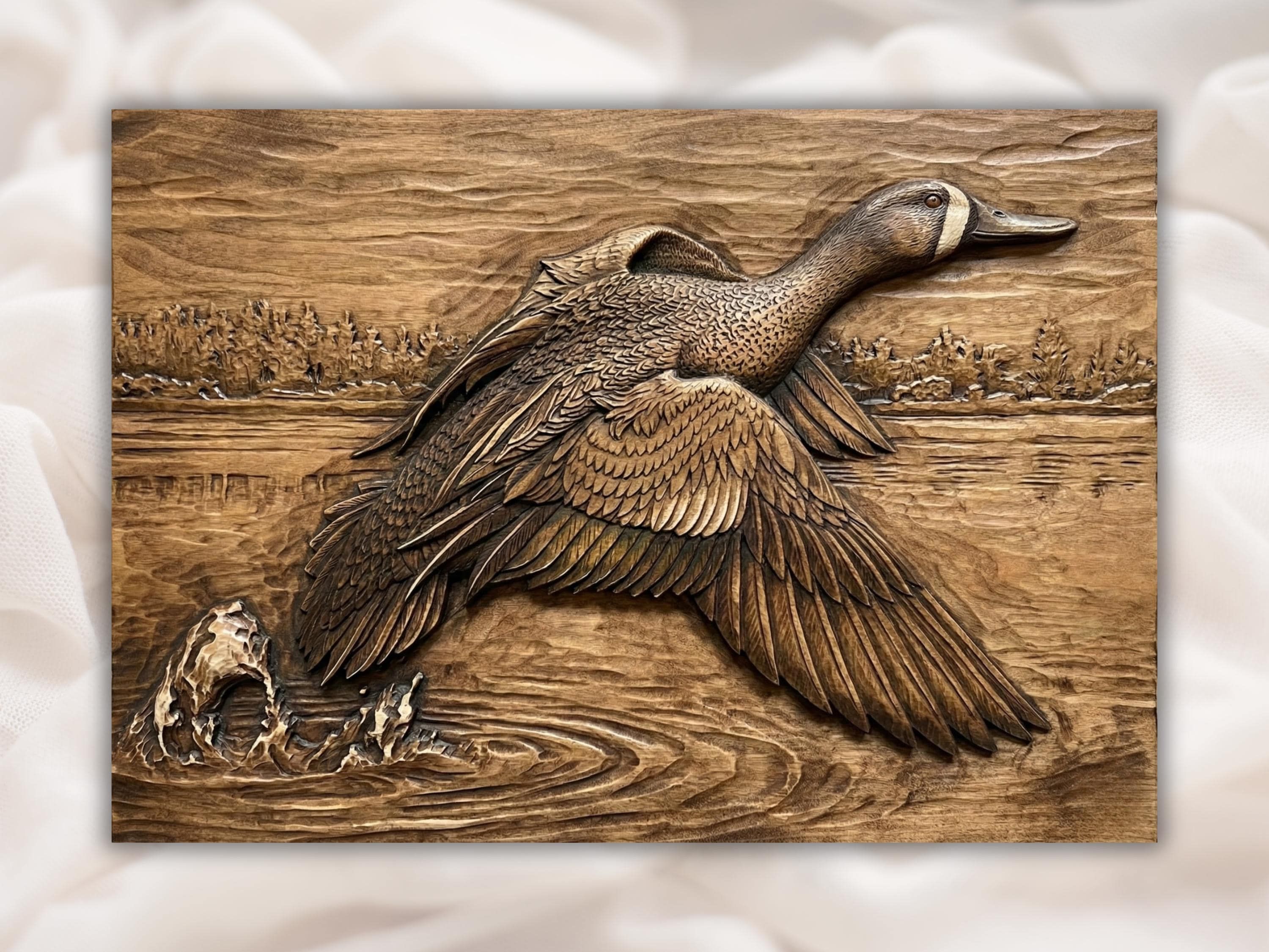 Wood bas-relief carving of a duck flying low over rippled water with detailed wings