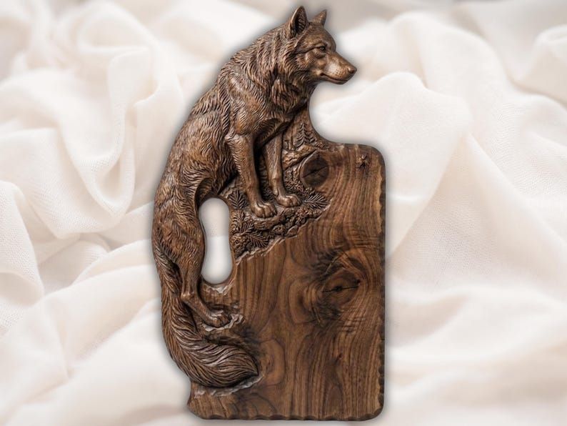 Carved wooden serving board with a sitting fox in relief and its bushy tail forming a side handle
