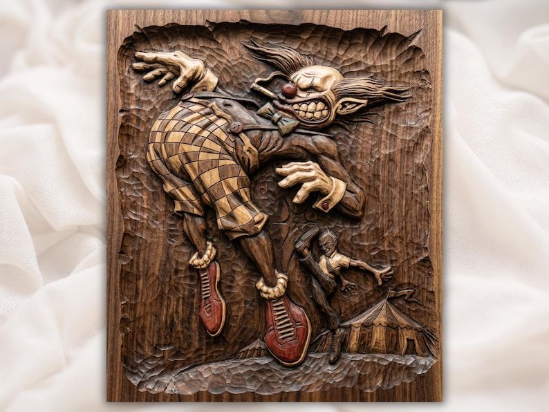 Carved wood relief of a grinning cigar-smoking clown kicking a tiny performer out of a circus tent