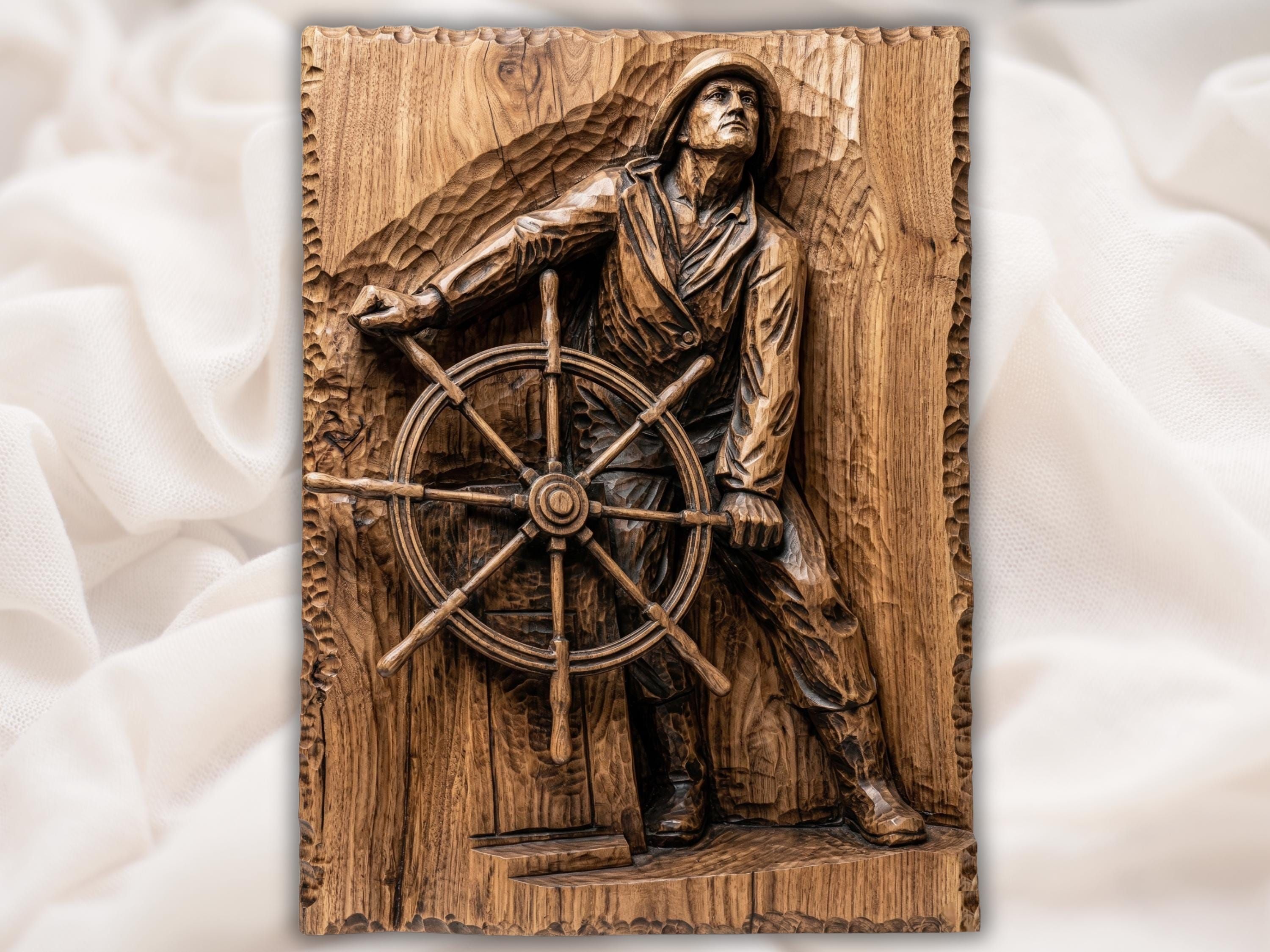 Carved wood relief of a fisherman in oilskins and a sou'wester hat gripping a ship's steering wheel