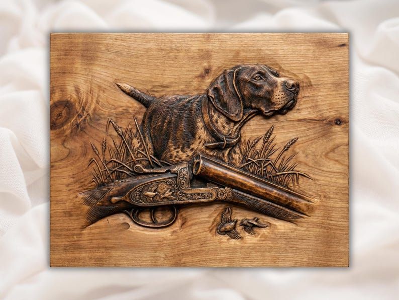Carved wood relief of a pointer hunting dog beside an engraved side-by-side shotgun in field grass.