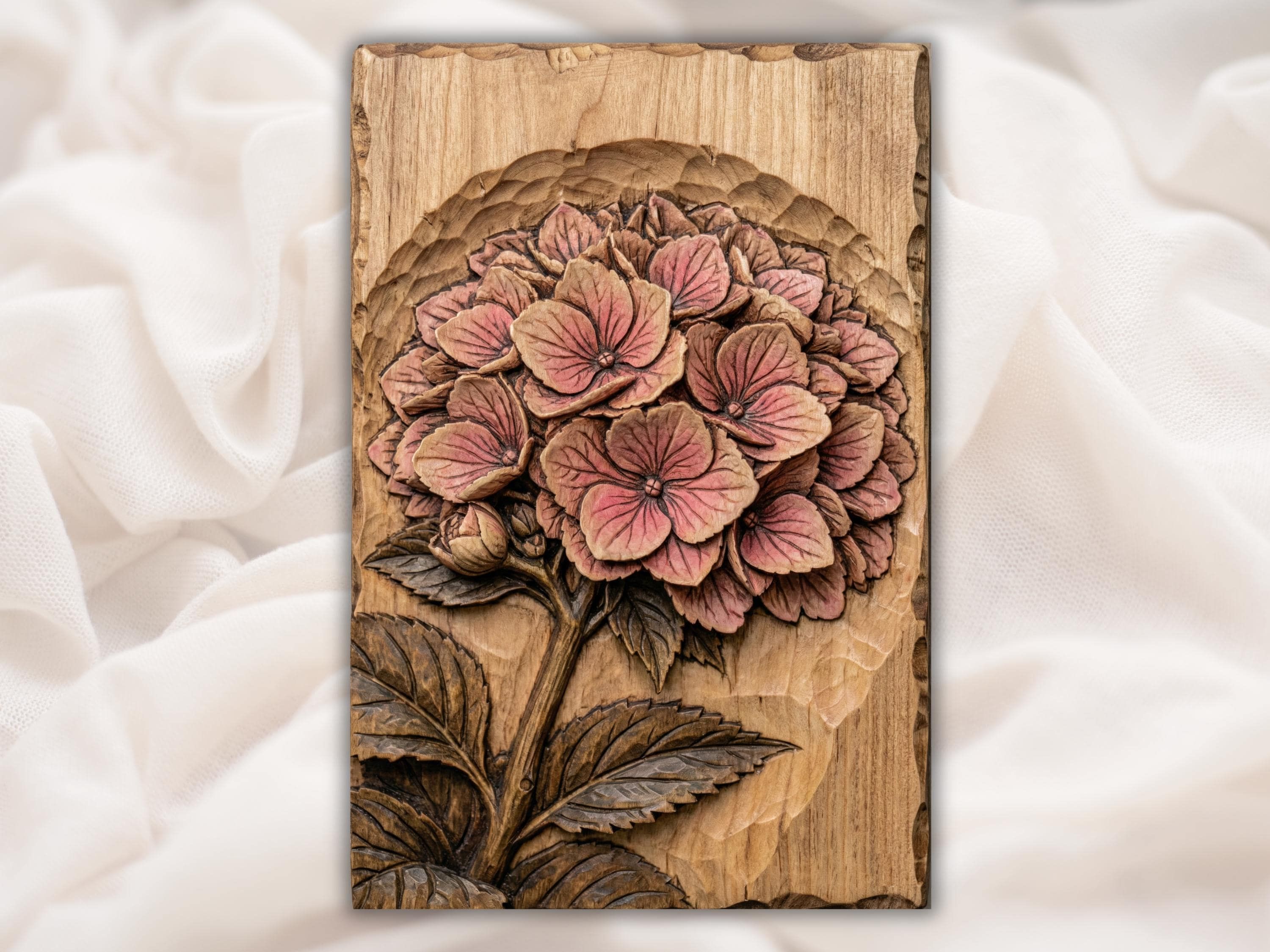 Carved wood bas-relief of a blooming hydrangea cluster with layered pink petals, stem and serrated leaves.