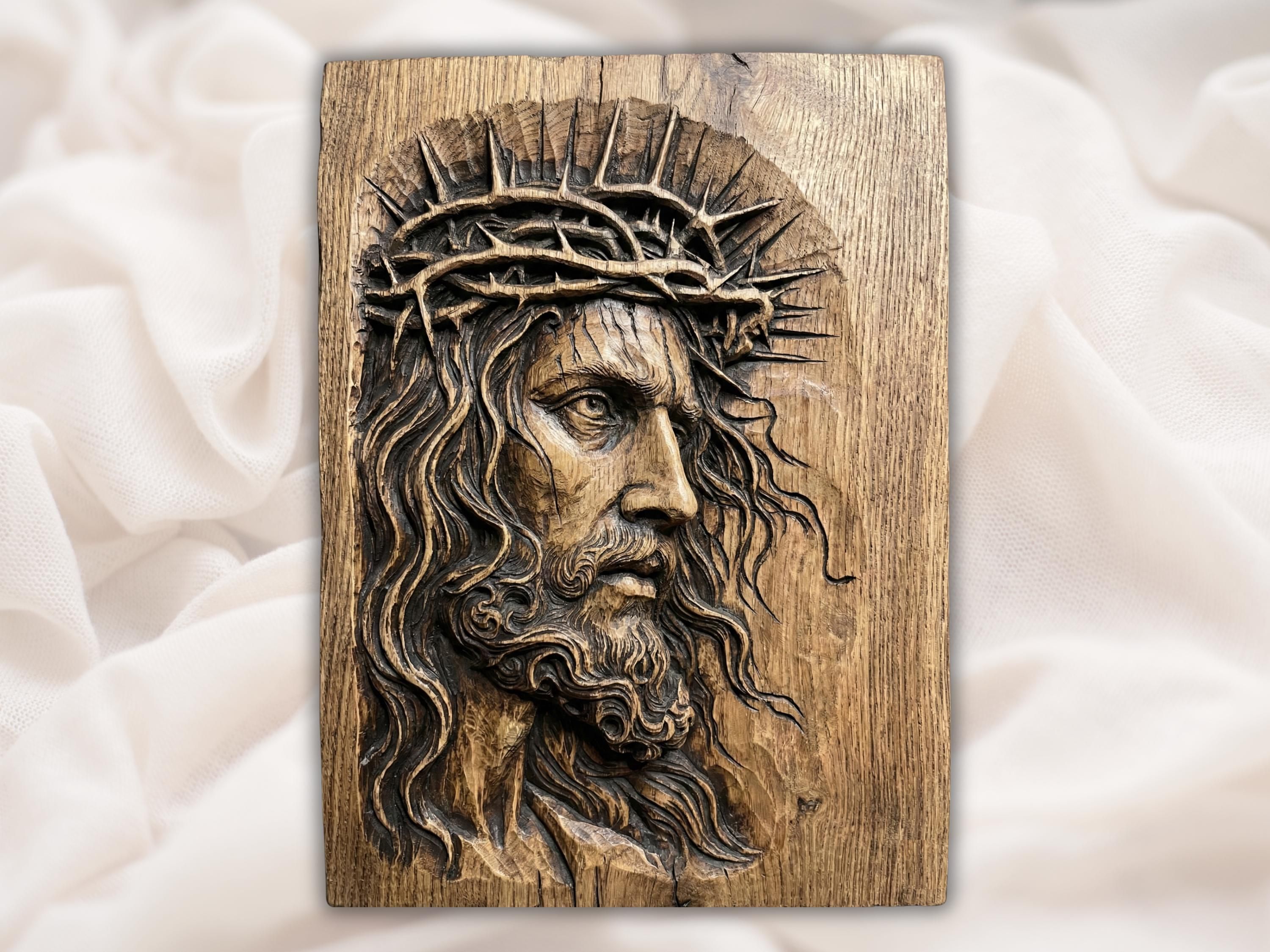 Wood-carved bas-relief of Jesus Christ wearing a crown of thorns with flowing hair and beard