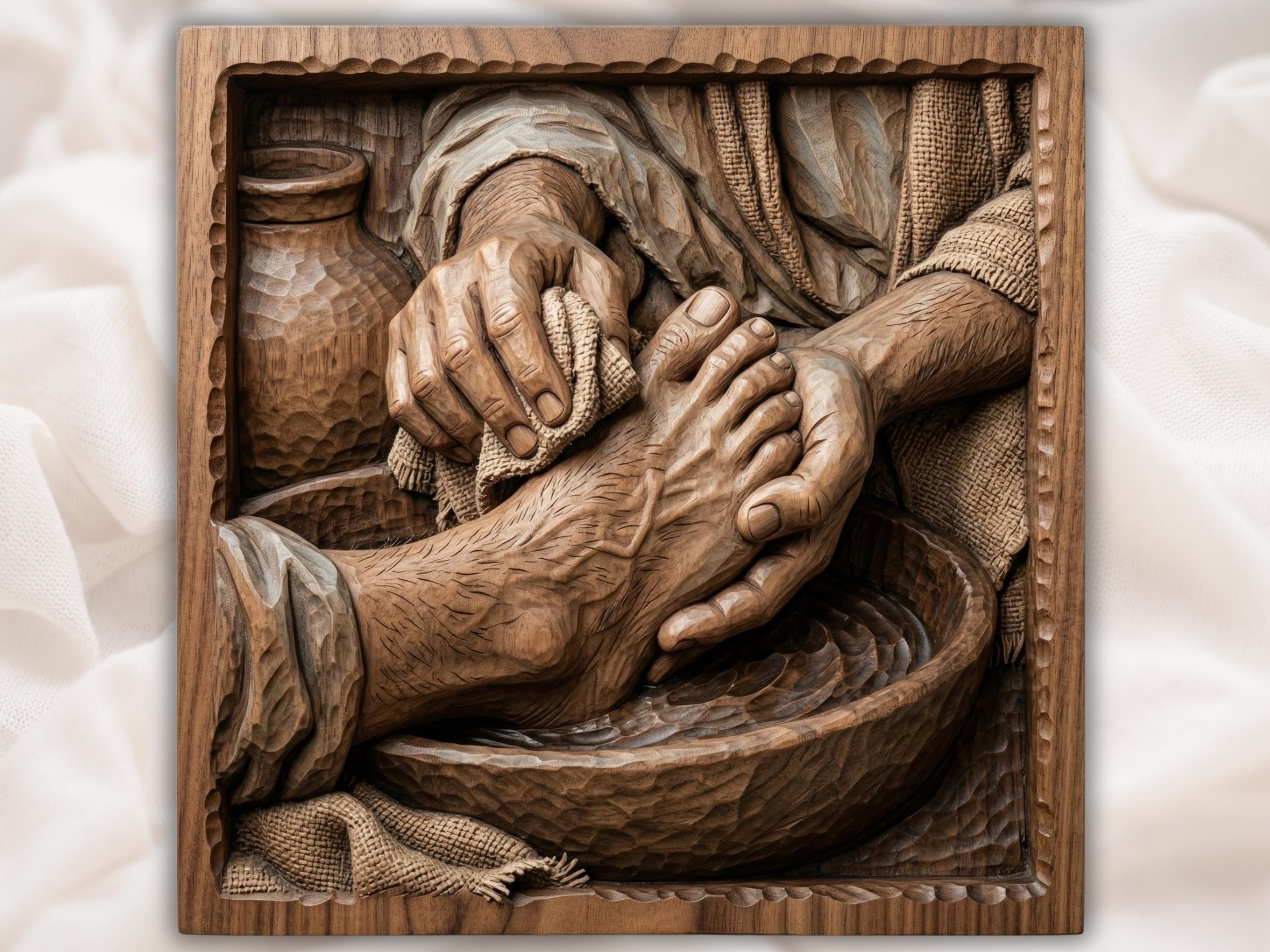 Wood bas-relief carving of a hand holding a cloth washing a bare foot, John 13 scene