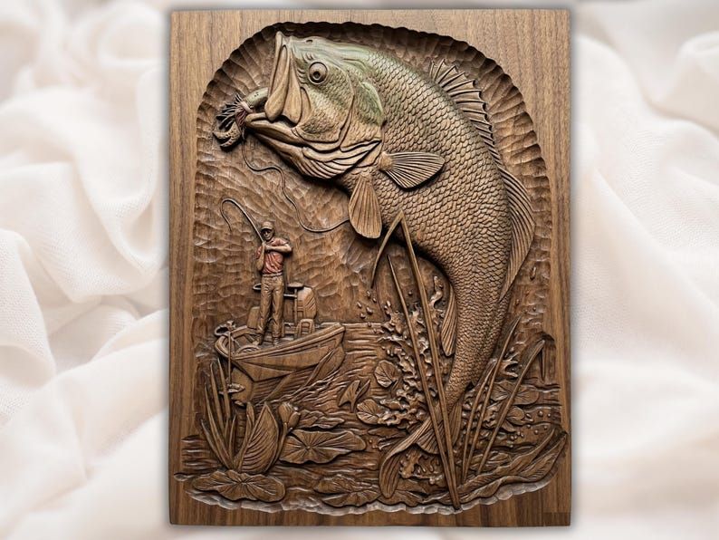 Carved wood relief of a largemouth bass leaping at a lure above an angler fishing from a boat among reeds