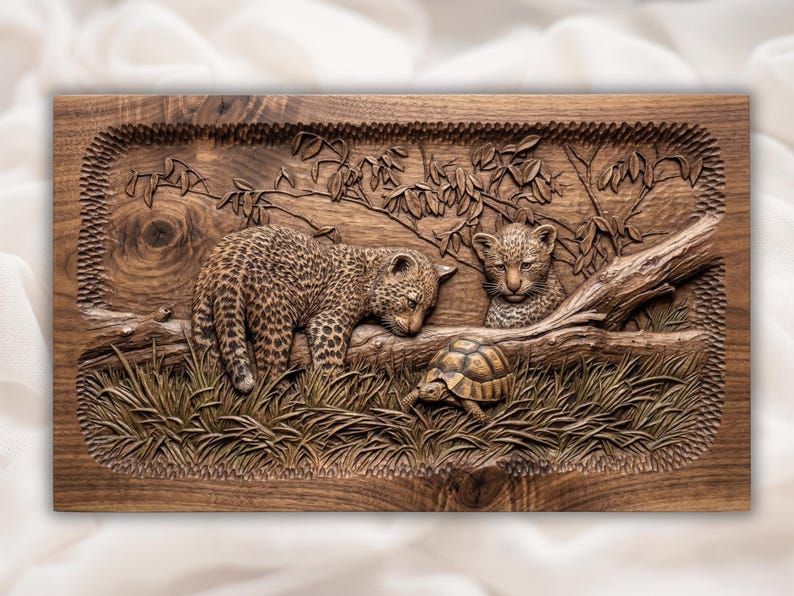 Carved wood relief of two leopard cubs on a branch watching a tortoise crawl through grass