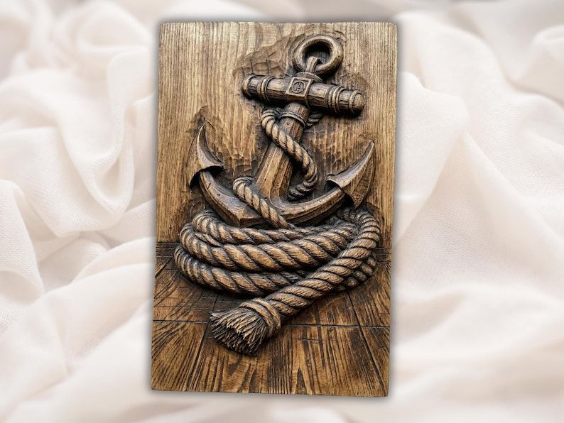 Bas-relief wood carving of a ship anchor wrapped in thick coiled rope on weathered plank background