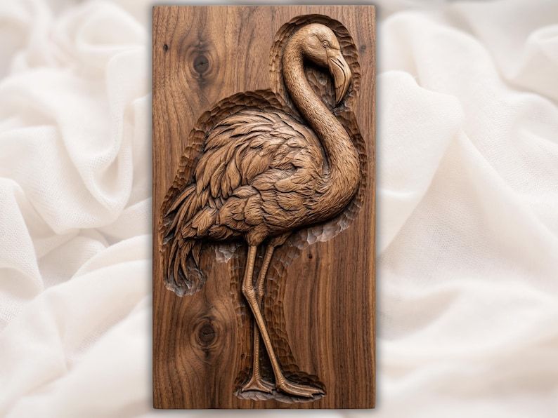 Carved wood bas-relief of a standing flamingo with curved neck and layered feathers on a walnut panel