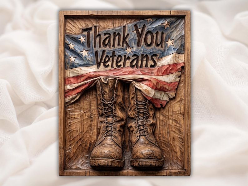 Carved relief of worn combat boots beneath an American flag with the words Thank You Veterans above, in a wood frame.