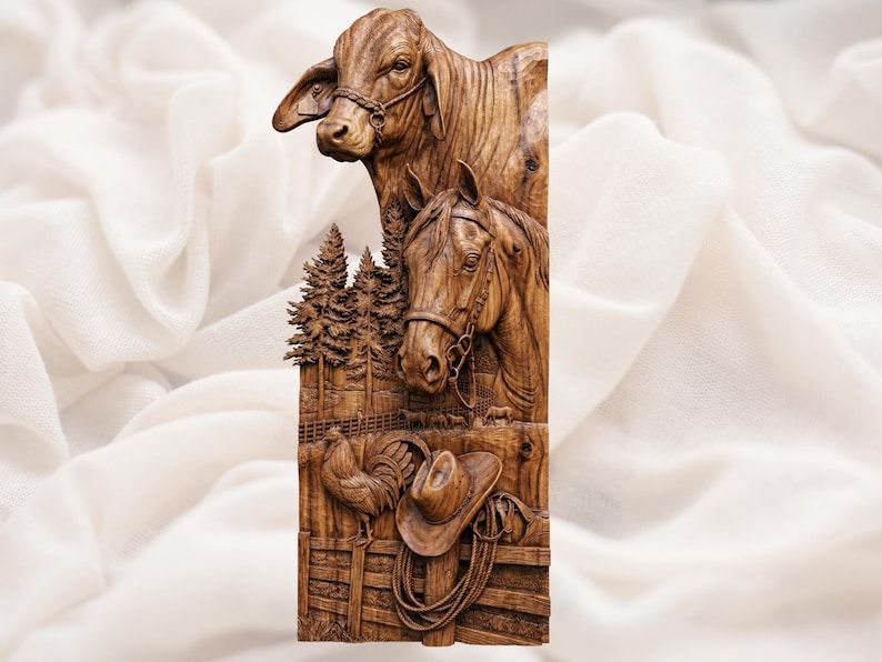 Carved wood relief of a Brahman cow and horse with pine trees, a fence, cowboy hat, and lariat rope.