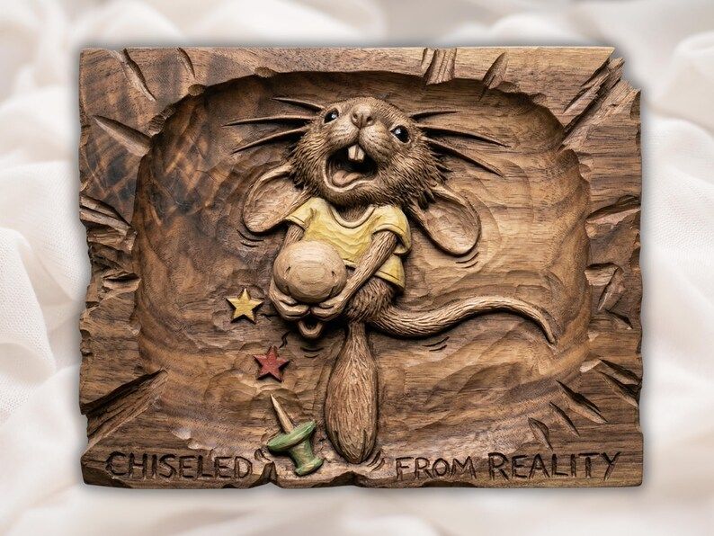 Carved wood bas-relief of a wild-eyed mouse in a t-shirt bursting from a plank holding a ball, with stars and a top