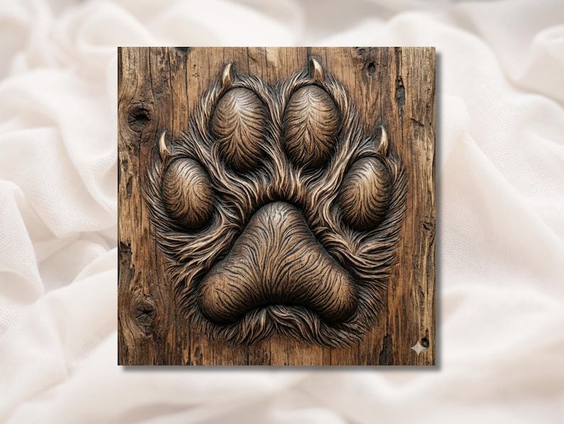 Bas-relief wood carving of an animal paw print with four clawed toes and detailed flowing fur texture
