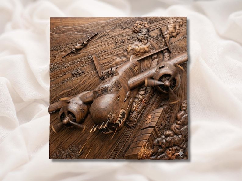 Carved wood bas-relief of a WW2 twin-engine bomber strafing a burning train with smoke and flames